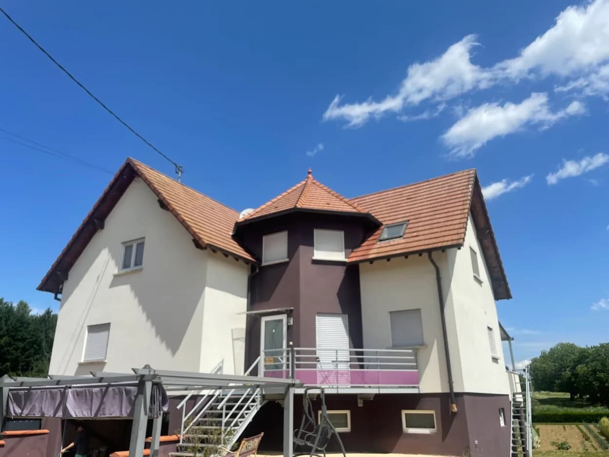 Après intervention : Toiture de maison à tourelle